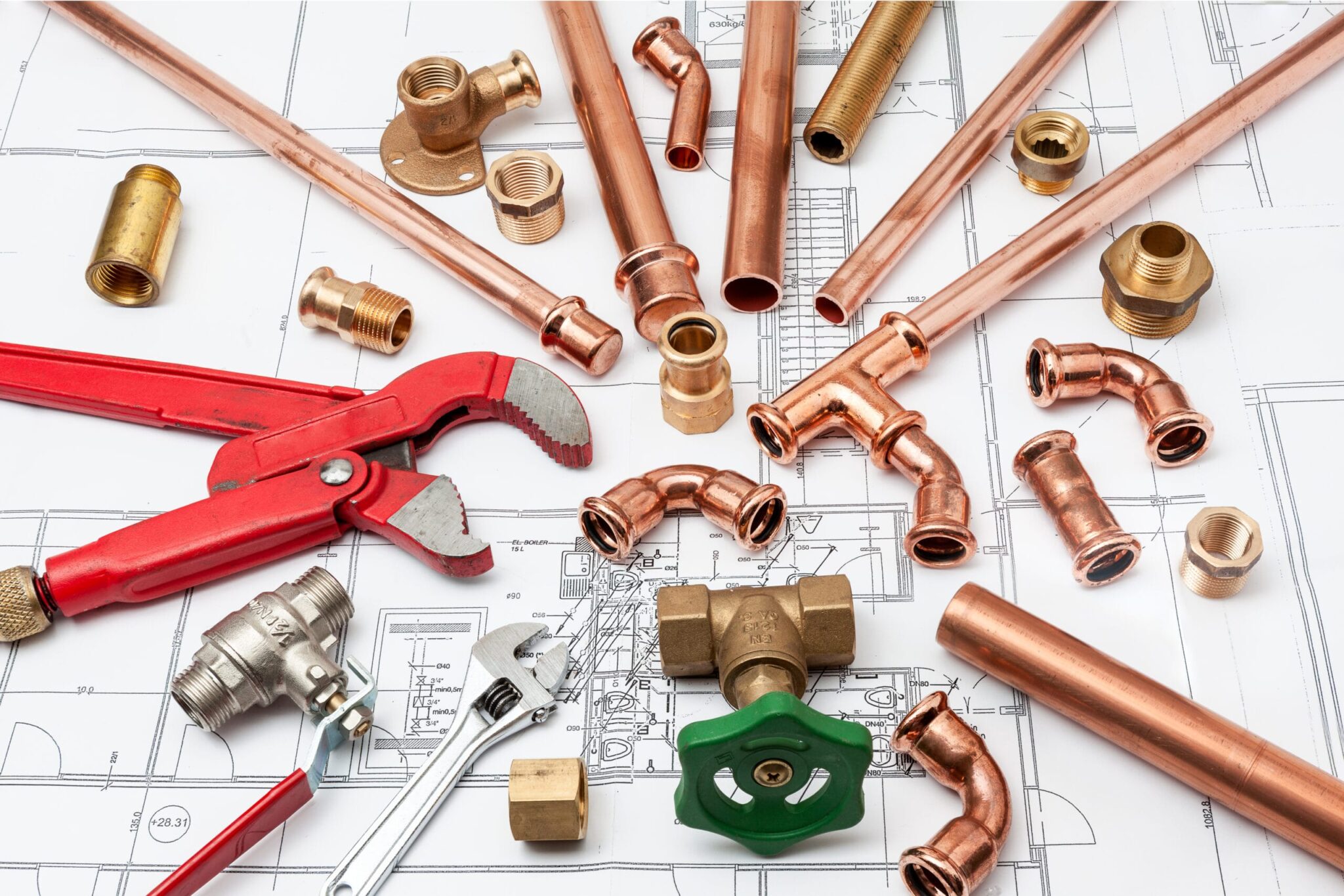 Copper pipes, fittings, valves, and plumbing tools in Vancouver